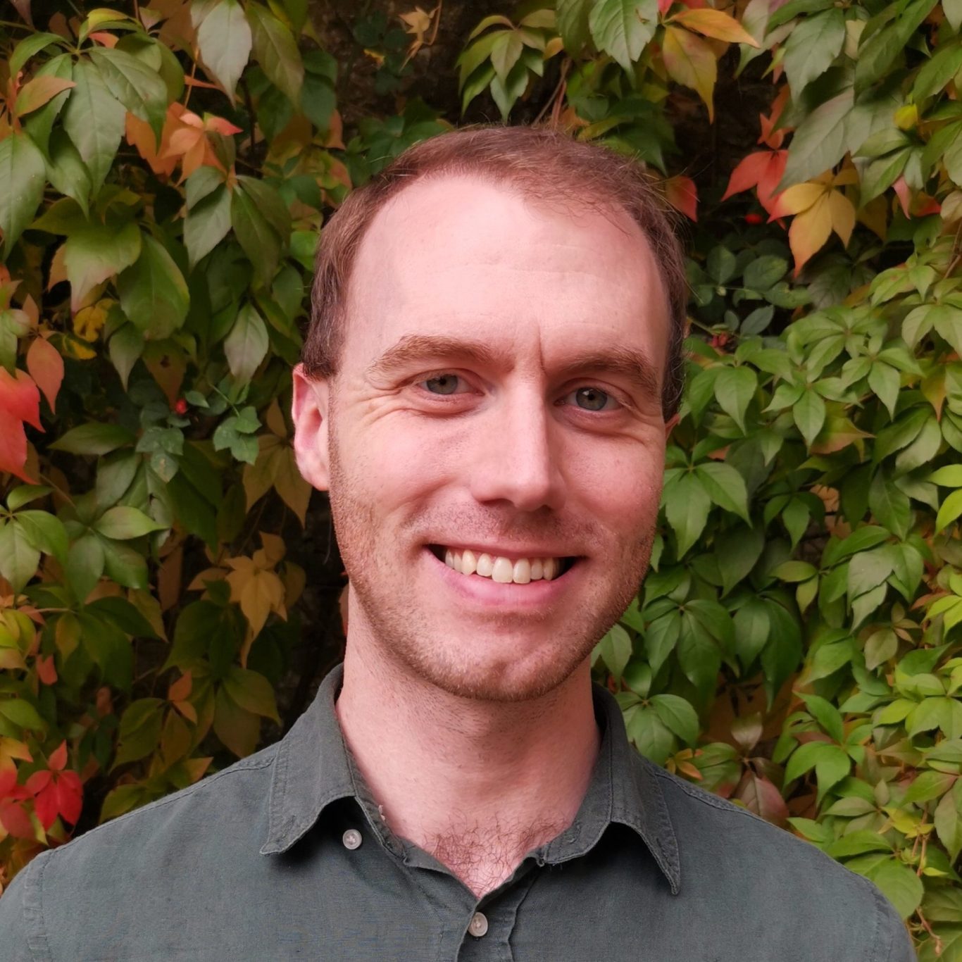 Dr Owen Rye Clinical Psychologist Photo of Dr Owen Rye Clinical Psychologist smiling in front of autumn foliage